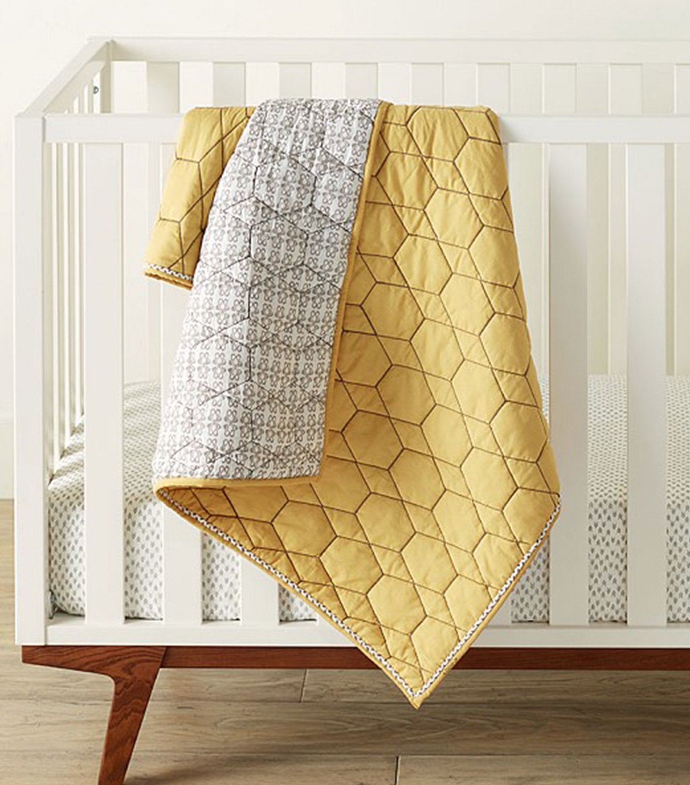 west elm x pbk honeycomb toddler quilt - horseradish